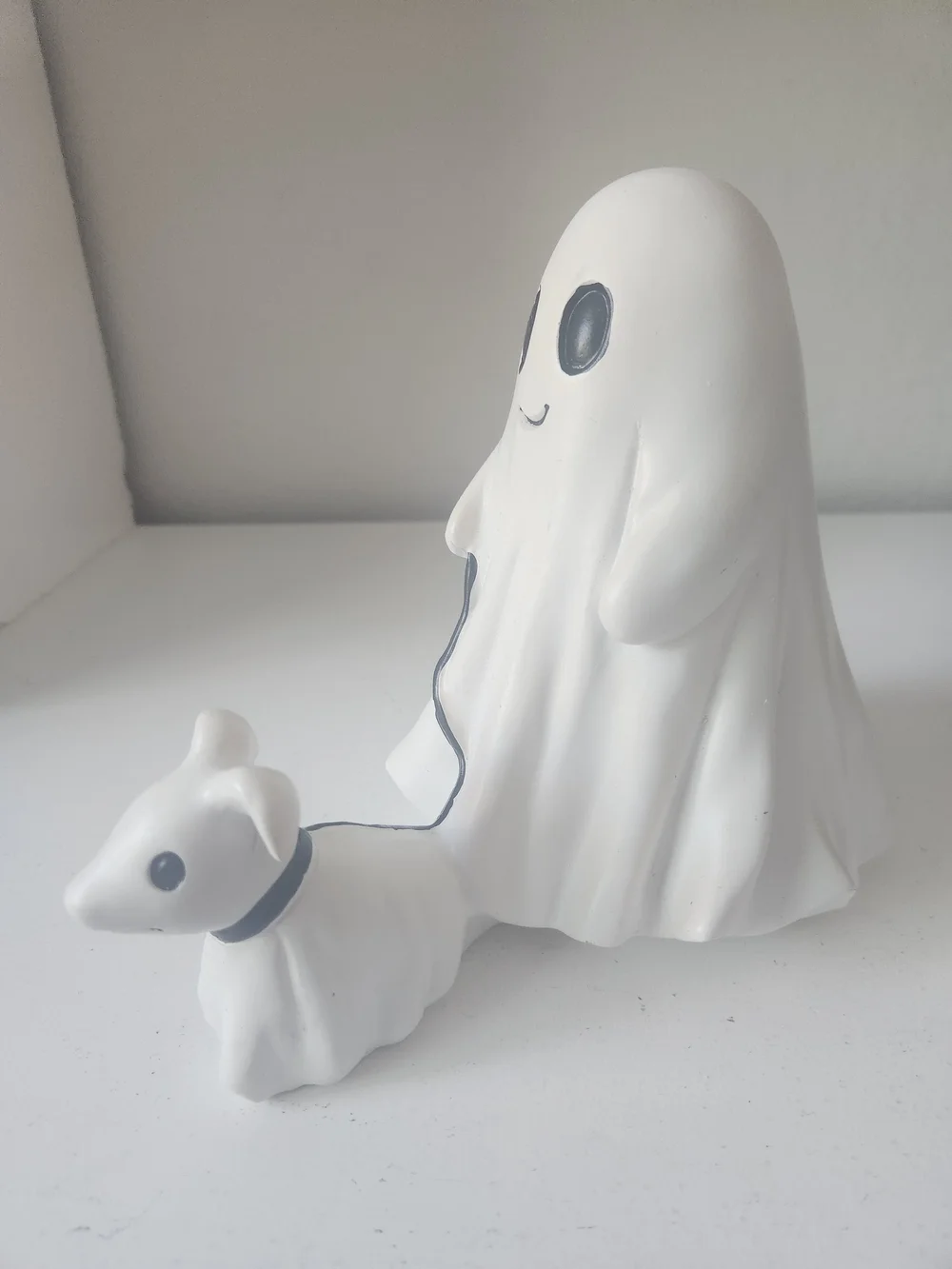White Resin Ghost Figurine Walking A Ghosr Dog